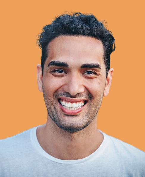 Photo of a man smiling, photo for "Specialised Solutions"